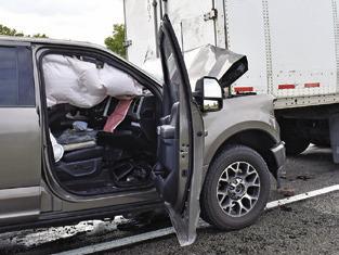 THIS FORD PICKUP was damaged on Wednesday, Sept. 4, on State Highway 36 South. Tribune photo by Roy Sanders