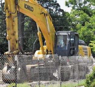 DEMOLITION WORK continues at the old Somerville Junior High School. The school district is demolishing the site as part of their bond issue project.