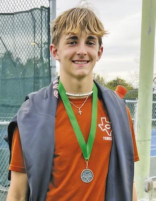 DYLAN CHAPMAN placed second in boys singles at the Taylor Varsity Tournament.