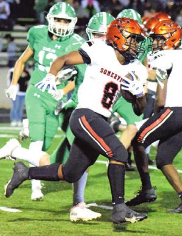 DEVEN GREEN runs with the ball during Somerville’s bi-district game against Eldorado last Thursday night in Burnet.