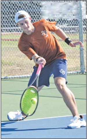 WAYLON CHAPMAN returns serve during the Caldwell-Cameron Yoe match last Thursday. — Tribune photo by Roy Sanders
