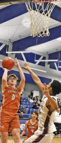 CAYDEN ZBORIL takes a shot against A&amp;M Consolidated JV at the Mumford Tournament. Tribune photo by Roy Sanders