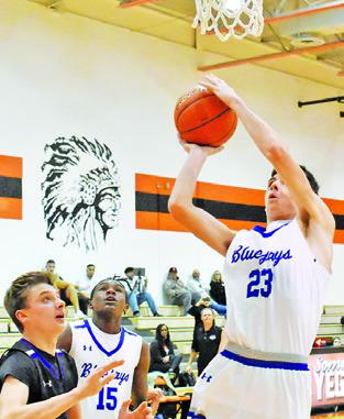 JOSH GREEN of Snook takes a shot against Aggieland Homeschool JV at the Koppers Tournament in Somerville.