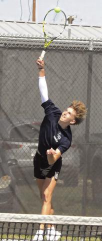 CALDWELL’S DYLAN Chapman is pictured serving at the Caldwell Classic Varsity Tennis Tournament in 2025. Chapman competed at the UIL Class 4A State Tennis Tournament, earning a spot on The Tribune’s Top 10 Sports of 2025 list. Tribune photo by Denise Squier