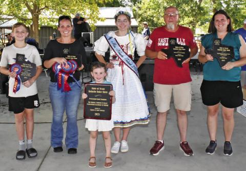 KOLACHE FESTIVAL BAKING grand champions included, from left, Shane Kienow, youth, Cherisse Walker, non-professional state, Caroline Campbell of Jake’s Bakery, professional, Eric Muehlstein, kolache roll, and Nicole Godwin, non-professional, Burleson County. Joining them is Miss Kolache Festival Olivia Supak.