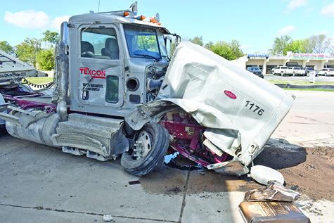 THIS TRUCK RIG was damaged on Friday, Nov. 14, in an accident on State Highway 21 near Thomas Street. See story page 3A. Tribune photo by Roy Sanders