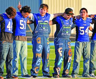 SNOOK FOOTBALL PLAYERS showed their school spirit at last week’s “Meet the Bluejays” at Bluejay Stadium. Tribune photo by Kimberly Hutcheson