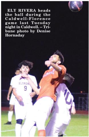 ELY RIVERA heads the ball during the Caldwell-Florence game last Tuesday night in Caldwell. -- Tribune photo by Denise Hornaday
