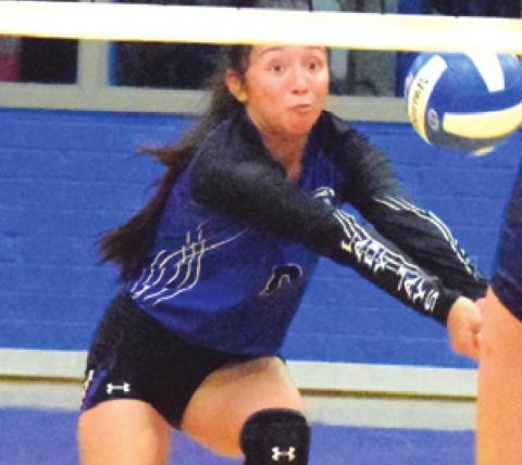 SNOOK SENIOR PAOLA Arredondo dives to bump the ball during the Lady Jays match against Madisonville last Tuesday night in Snook. -- Tribune photo by Denise Squier