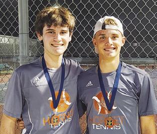 CONNOR HUGHSON and Waylon Chapman placed first in Boys Doubles at the Madisonville Mustang Invitational Varsity #2 Tournament.