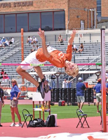 DANIEL COWAN JUMPS at the state track meet in Austin.