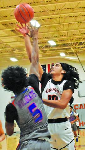 GARDNER SHIVERS of Somerville takes a shot against Temple JV at the tournament.