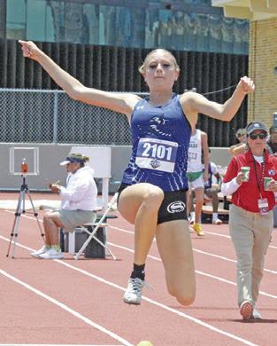 SNOOK’S DAKOTA KIENOW is pictured competing in the Class 2A girls triple jump during the UIL State Track &amp; Field Meet. Kienow and six other Snook athletes have qualified for the TAAF State Championships. Tribune photo by Denise Squier