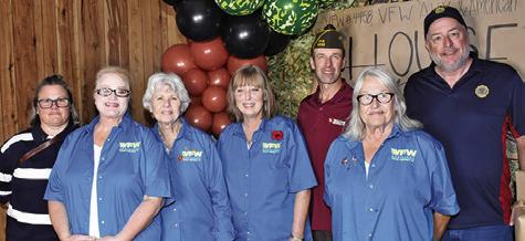 CALDWELL VFW AUXILIARY members are pictured last Saturday, Nov. 8, at the house party at the VFW post. They include, from left, Lisa Harrell, Jennifer Fraustro, Patsy Hughes, Karen Bolt and Gayle Rhodes. Also pictured are Jonah Harrell of the VFW and Lee Hoermann of the American Legion posts.