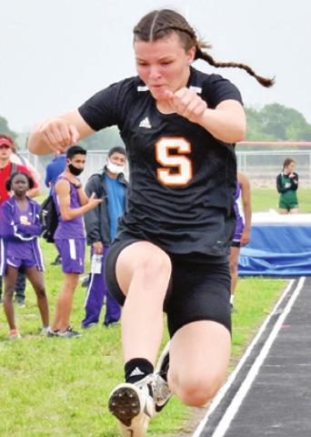 EMMA KOVASOVIC places third in the triple jump at the Class 2A Area District 25/26 Track and Field Meet last Wednesday in Snook.