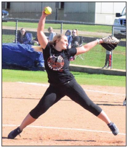 FORMER LADY HORNET pitcher Casey Kauder shows that she hasn’t lost her form during the annual Lady Hornet Alumni Scrimmage on Saturday, Feb. 1.