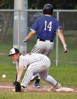 SOMERVILLE’S LUKE Moses reaches for the ball. -- Tribune photo by Roy Sanders