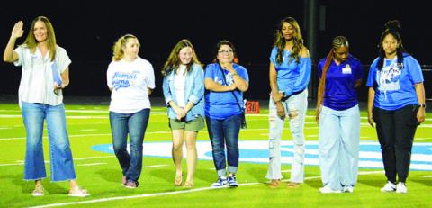 SNOOK’S 2011 AND 2012 state champion girls track teams were recognized on Friday at the Snook-St. Stephen’s football game. Tribune photo by Kim Hutcheson