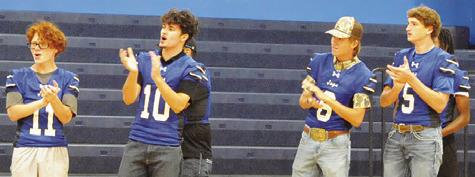 SNOOK BLUEJAY FOOTBALL players applaud for each other as each team member was announced during Monday’s “Meet the Bluejays.” Tribune photo by Denise Squier