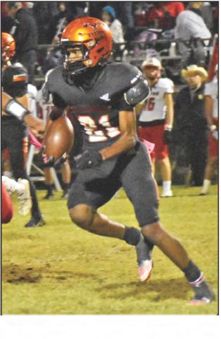SOMERVILLE’S DOMINIC Tucker carries the ball against Burton. The Yeguas lost 71-20.