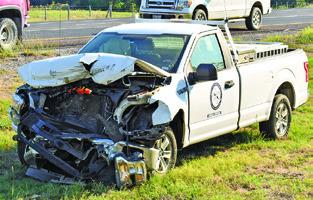 THIS CITY OF Caldwell truck was damage the Friday accident on State Highway 21 West and F.M. 908. Tribune photo by Roy Sanders