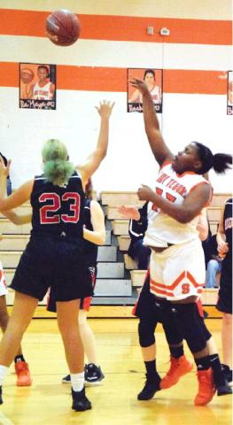 SOMERVILLE’S NICOLE RUSSELL puts up a shot during the Lady Yeguas 82-13 win over Richards Friday night at home. Russell scored five points in the win. -- Tribune photo by Denise Hornaday
