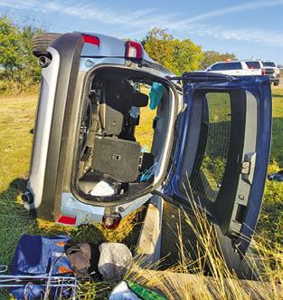 A HOUSTON woman was injured in this onecar rollover accident on Nov. 13 off F.M. 2155.