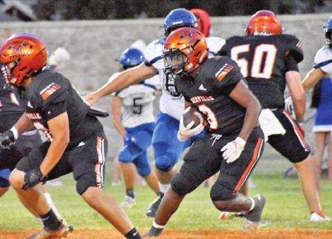 ARVIS BURNS CARRIES for Somerville against Jewett Leon.