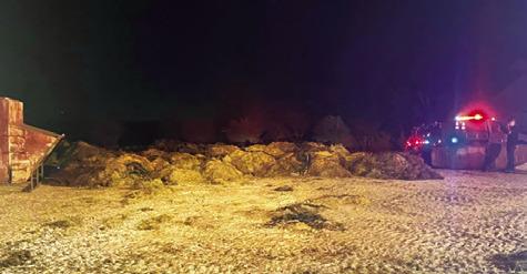 THESE HAY BALES were pulled out of the barn during the Oct. 30 fire off State Highway 21 East near Cooks Point. Photo courtesy of the Cooks Point Volunteer Fire Department