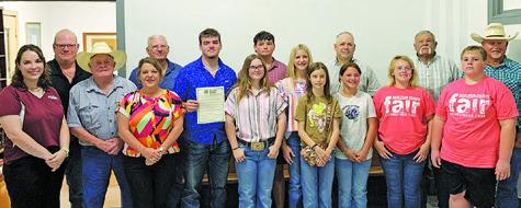 BURLESON COUNTY 4-H CLUB members join the Burleson County Commissioners Court at the commissioners Monday meeting to celebrate National 4-H Week.