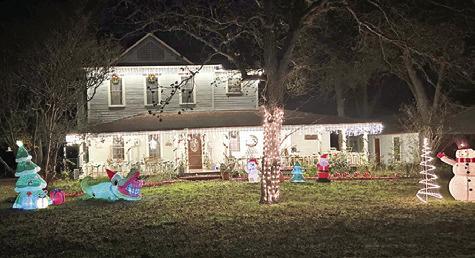 THE RESIDENCE OF The Hardin Family was awarded honorable mention of the Snook EEA’s “Christmas Lights of Snook” contest.