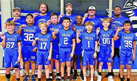 THE SNOOK DIVISION 3 flag football team recently won the 2025 Division 3 championship by defeating Somerville 13-12 in the title game. The championship team includes, from left, front, Zachary Giesenschlag, Gus Giesenschlag, Adan Rico, DJ Cotton, Grayson Giesenschlag, Noe Sierra, middle, Jose Vasquez, Jase Hruska, Cornell Curry, back, Coach Derek Cotton, Coach RJ Giesenschlag, Coach Wade Giesenschlag, Coach Justin Hruska and Coach Cornell Corry.