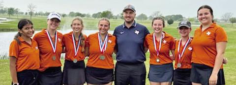 THE CALDWELL GIRLS golf team includes, from left, Patsy Pineda, Alison Krueger, Madilyn Schneider, Tanzley Johnson, Coach Jacob Schaefer, Raeleigh Ussery, Brandy Gillar and Kierstyn Macik.