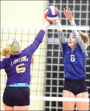 JAYCIE BRISCO BLOCKS a hit from Granger’s Carsyn Locklin-Bilbrey during Snook’s bi-district loss on Tuesday in Rockdale.