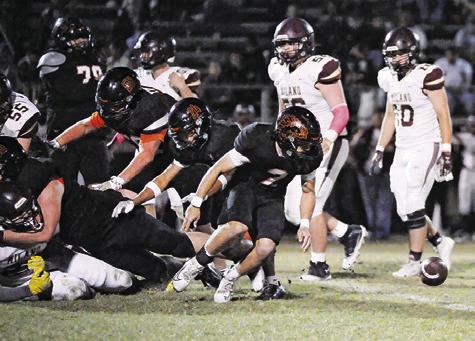 THE BALL IS FREE for Somerville defenders in the Milano game. Pictured are Colt Holton, Kaleb Leang and Martin Espinoza. Tribune photo by Denise Squier