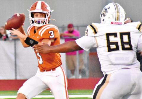 QUARTERBACK RYAN SHUPAK prepares to throw a pass.