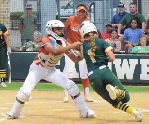 LADY HORNET CATCHER Aliyah Vela tags out a Lexington runner at the plate during Caldwell’s 5-3 loss to the Lady Eagles last Tuesday night at Lady Hornet Field. -- Tribune photo by Denise Squier