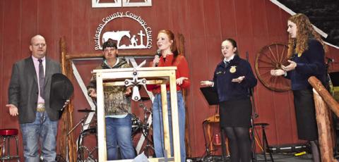 BURLESON COUNTY EXTENSION Agent John Grange, left, is joined by local youth at the Ag Breakfast. They include Logan Barnes, Cayle Canon, Hadley Howe and Kylie Jo Neuendorff.