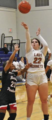 HANNAH RAE CLARK shoots during the recent Caldwell-Burton game at Hornet Gym. Tribune photo by Roy Sanders