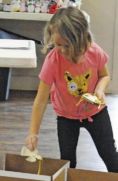 VOLUNTEERS OF all ages help prepare boxes for shipping to breast cancer surgery patients during Saturday’s Blessing Box Project “Sew-In,” hosted by the Snook EEA.