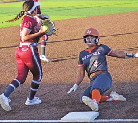 CALDWELL’S ALIYAH VELA slides into third, but was called out.
