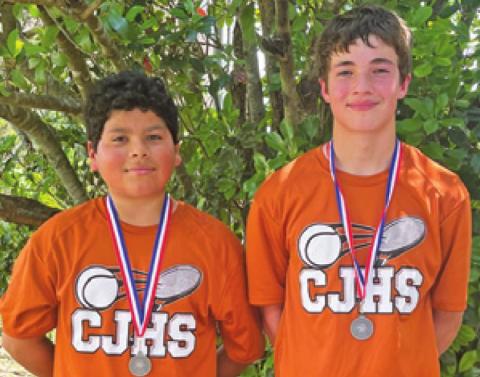KEVIN MARTINEZ and Brenden Lee placed in boys’ doubles in the eighth-grade competition at the district tennis tournament.