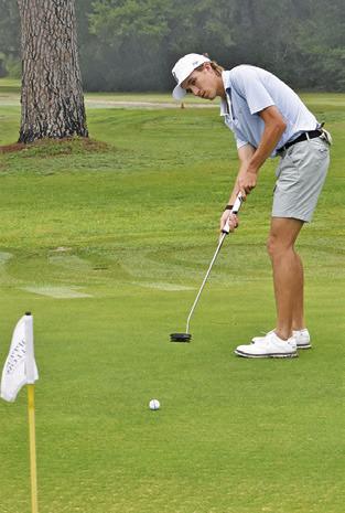 BRETT WITHEM of Snook works on putting.