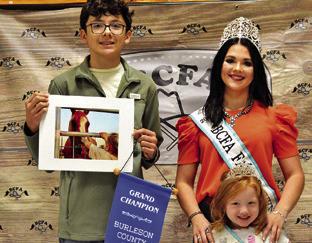 ETHAN RAMIREZ WON GRAND IN Senior Photography. Also pictured are Fair Queen Kodi Hitchcock and Little Miss Taytum Hohlt. Tribune photo by Sabine Lazo