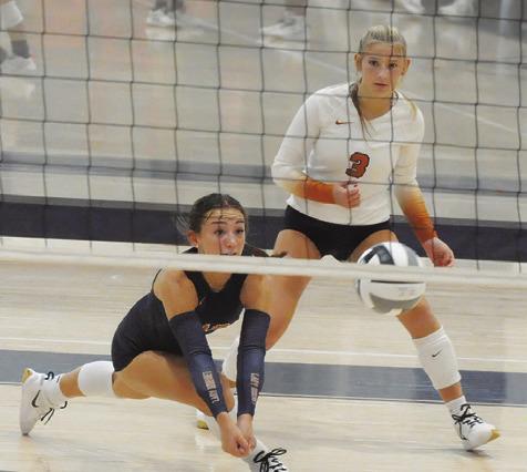 CALDWELL’S NATALIE EASTEPP lunges to get to the ball during Caldwell’s match against Klein Oak at last week’s Legends Invitational tournament in Bryan. Tribune photo by Denise Squier