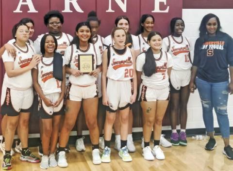 THE SOMERVILLE LADY YEGUA Junior High School basketball team won the Hearne Eagle Junior High Tournament championship by beating Mumford in the title game 32-17.