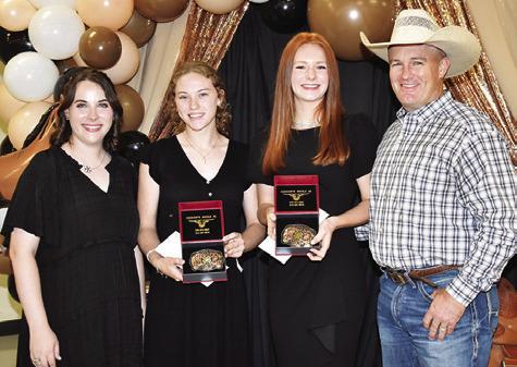 AVA FRY AND Cayle Canon are presented the I Dare You Awards by Megan Rogers and Steve Canon. Tribune photo by Roy Sanders
