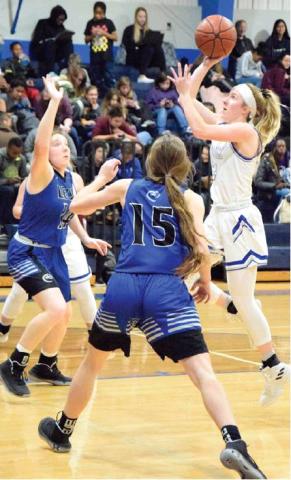 SNOOK’S JAYCIE BRISCO SHOOTS during the Lady Jays’ first tournament game against Leon on Thursday. Brisco scored a game-high 20 points, and Snook won 37-22. -- Tribune photo by Denise Hornaday
