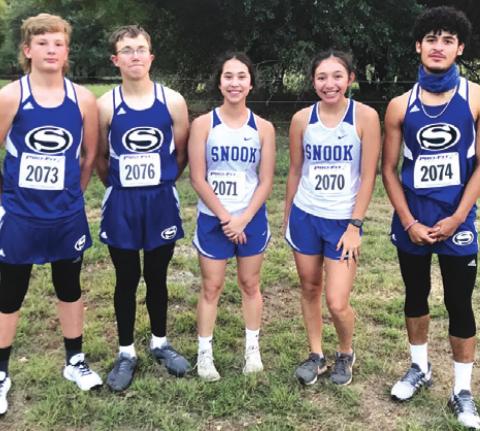 THE SNOOK CROSS COUNTRY team competed at the Salado Tenroc High School Invitational last week at Tenroc Ranch. The team includes boy runners, John See, Jared Bryan and Jose Garcia, and girl runners, Carmen Miller and Paola Arredondo.