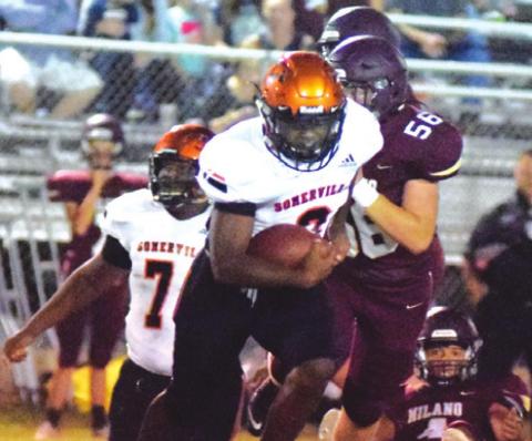 SOMERVILLE’S ARVIS BURNS breaks through the line for a 70-yard touchdown run during last Friday’s Yegua road win over Milano to open district play. -- Tribune photo by Denise Squier